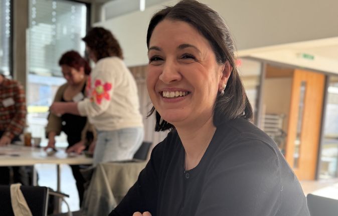 Lächelnde Teilnehmerin beim Marken-Workshop der Keppler-Stiftung